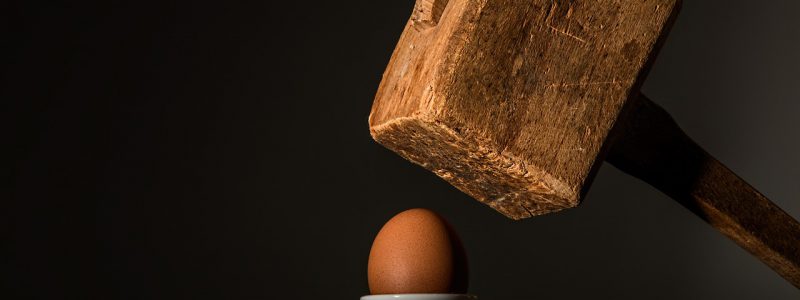 cracking an egg with a sledgehammer